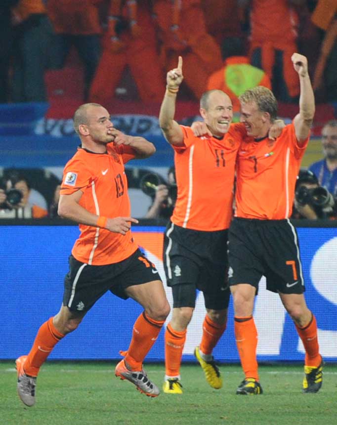 Holland celebrate their win over Brazil.